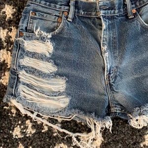 Levi’s Distressed Shorts with Raw Hem.